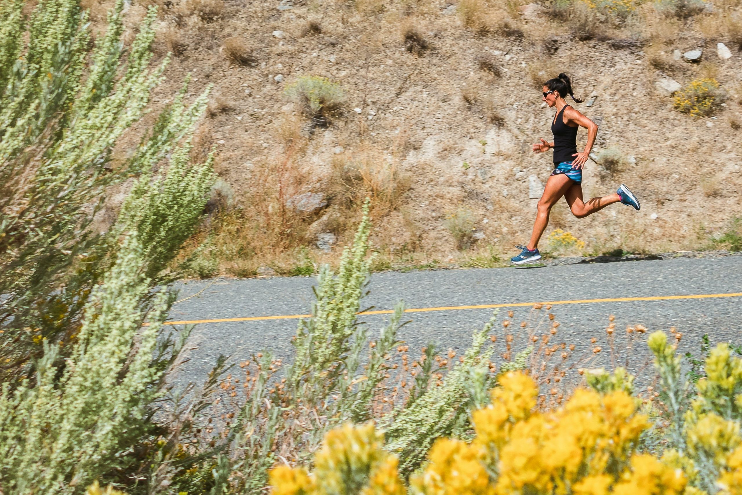 woman running out on the road